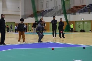 予選リーグで投げている写真